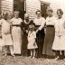 Katherine Weisen Fisher with granddaughters and daughter-in-law.jpg