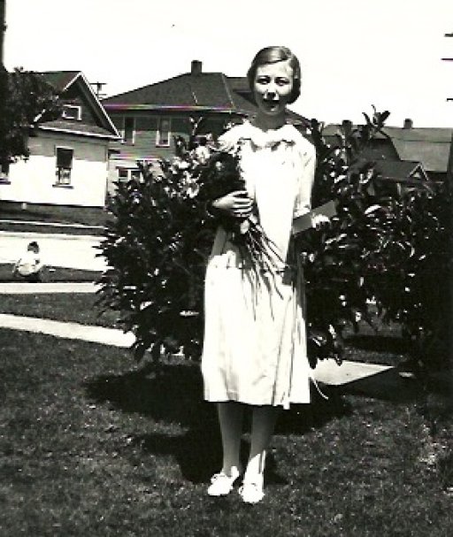 Mary with roses for her graduation.jpeg